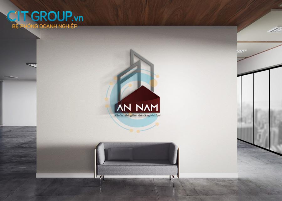 Logo Công ty Thiết kế kiến trúc An Nam đặt trên tường